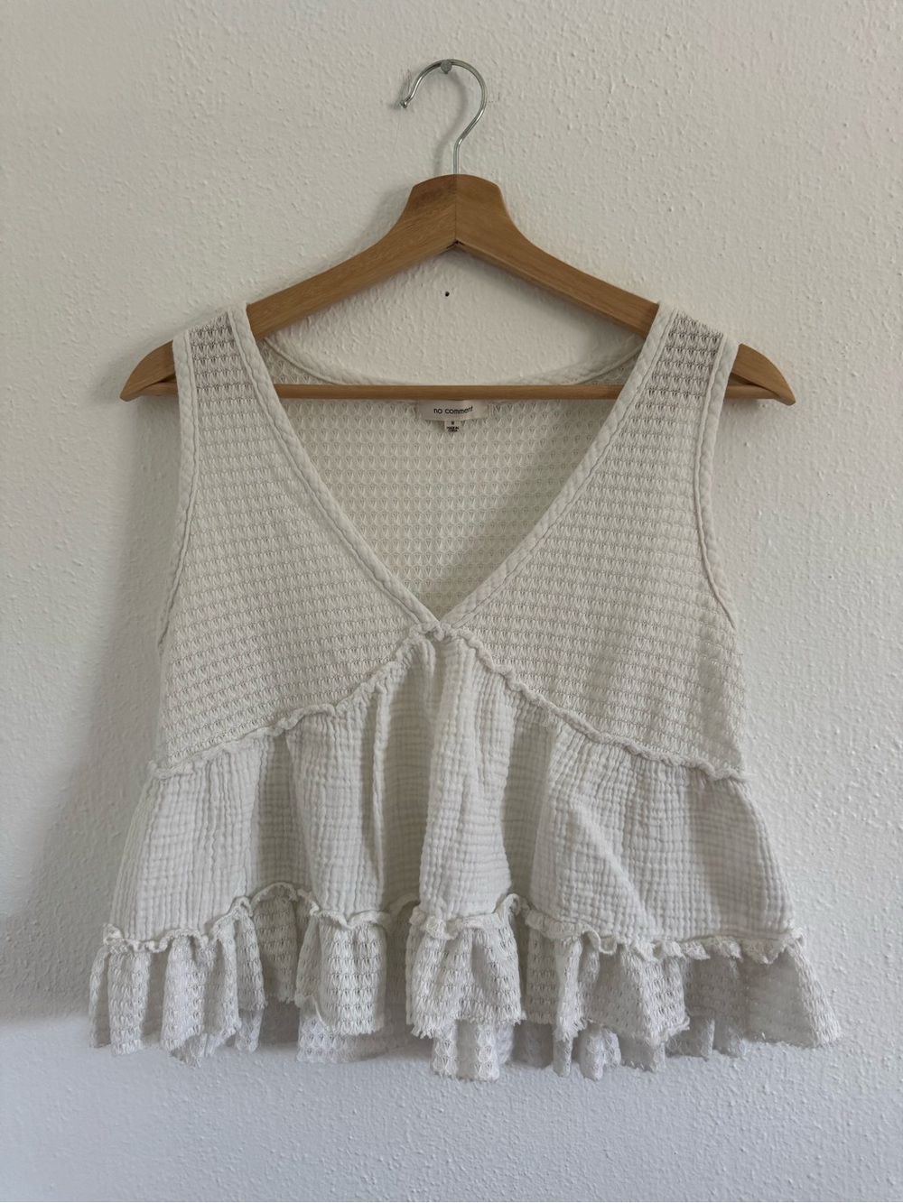 Sleeveless Cream Textured V-Neck Ruffle Peplum Top